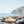 Santorini is one of the Cyclades islands in the Aegean Sea. It was devastated by a volcanic eruption in the 16th century BC, forever shaping its rugged landscape. The whitewashed, cubiform houses of its 2 principal towns, Fira and Oia, cling to cliffs above an underwater caldera (crater). They overlook the sea, small islands to the west and beaches made up of black, red and white lava pebbles