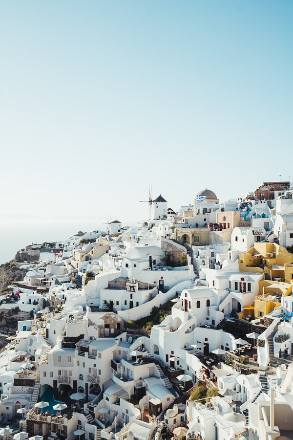 Oia is a coastal town on the northwestern tip of Santorini, a Greek Aegean island. The town has whitewashed houses carved into the rugged clifftops, and overlooks a vast caldera filled with water. In a 19th-century mansion, the Naval Maritime Museum has exhibits on local seafaring history, including old figureheads, sailors’ chests and models of old ships. Nearby is the ruined Oia Castle, known for its sunset views